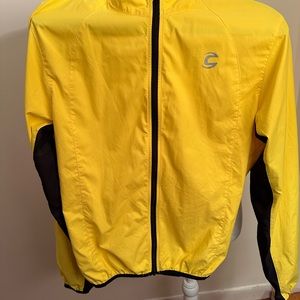 Cannondale blaze yellow biking jacket. Back pocket. Light reflective piping.